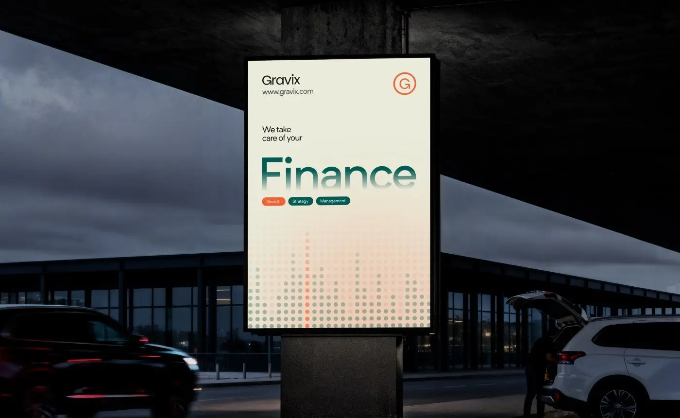 Gravix poster on a street sign at dusk